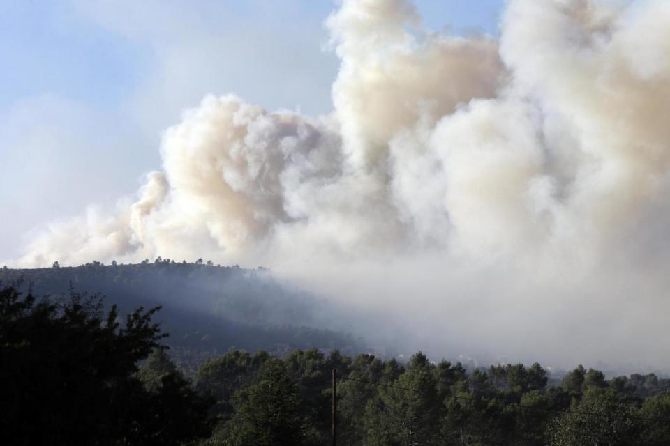 A forest fire burns near Seillons-Source- d'Argent, southern France (AP)