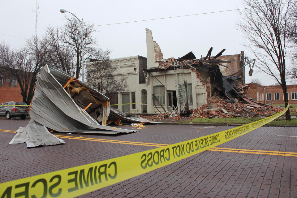 Severe storms sweeping across parts of the U.S. South were blamed for deaths and destruction, such as this unoccupied business on Main Street in downtown Greenville, Miss., Saturday, Jan. 11, 2020. The storms are blamed for the deaths of at least nine people, as high winds, tornadoes and unrelenting rain battered a large area of the South. (Catherine Kirk/The Delta Democrat-Times via AP)