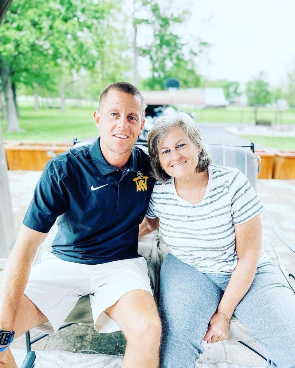 Greenfield-Central coach Luke Meredith with mother, Brenda Meredith. Brenda Meredith died in August following a three-year battle with colon cancer.