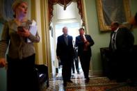 Senators Lamar Alexander (R-TN) and Mike Rounds (R-SD) depart a policy luncheon on Capitol Hill in Washington, U.S. October 17, 2017. REUTERS/Eric Thayer