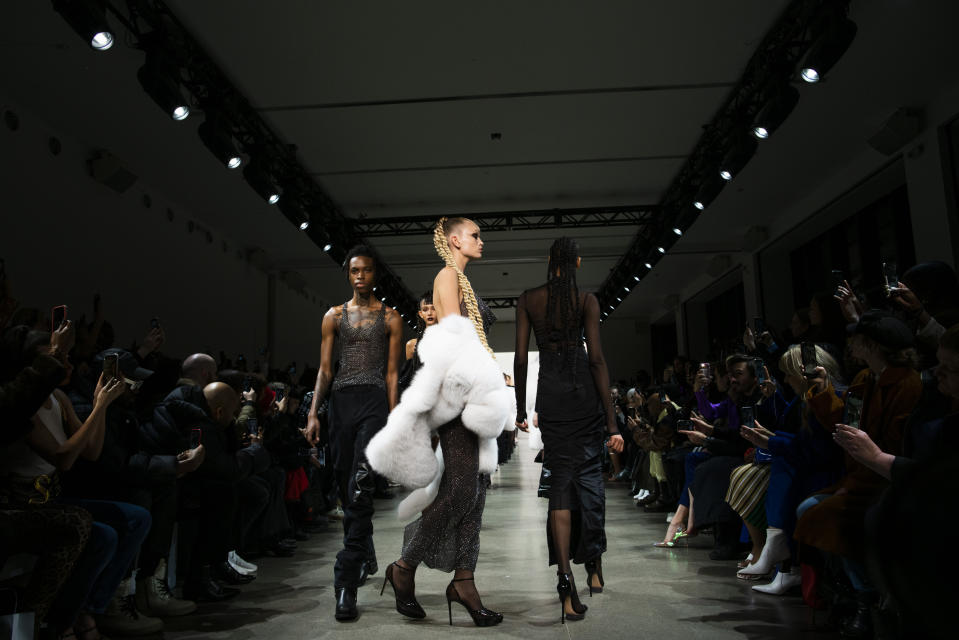 The LaQuan Smith collection is modeled during Fashion Week, Saturday, Feb. 8, 2020, in New York. (AP Photo/Eduardo Munoz Alvarez)