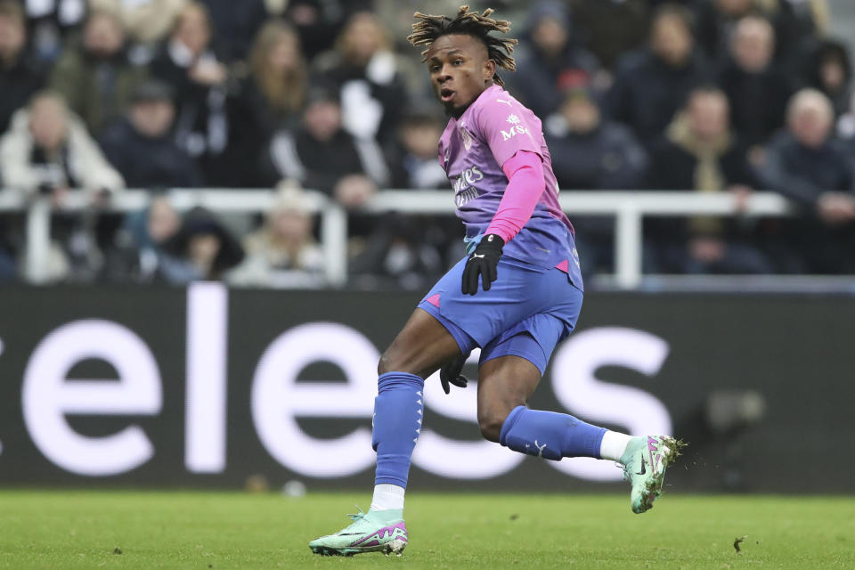 AC Milan's Samuel Chukwueze looks at his side's 2nd goal during the Champions League group F soccer match between Newcastle United and AC Milan at St. James' Park, in Newcastle, England, Wednesday, Dec. 13, 2023. (AP Photo/Scott Heppell)