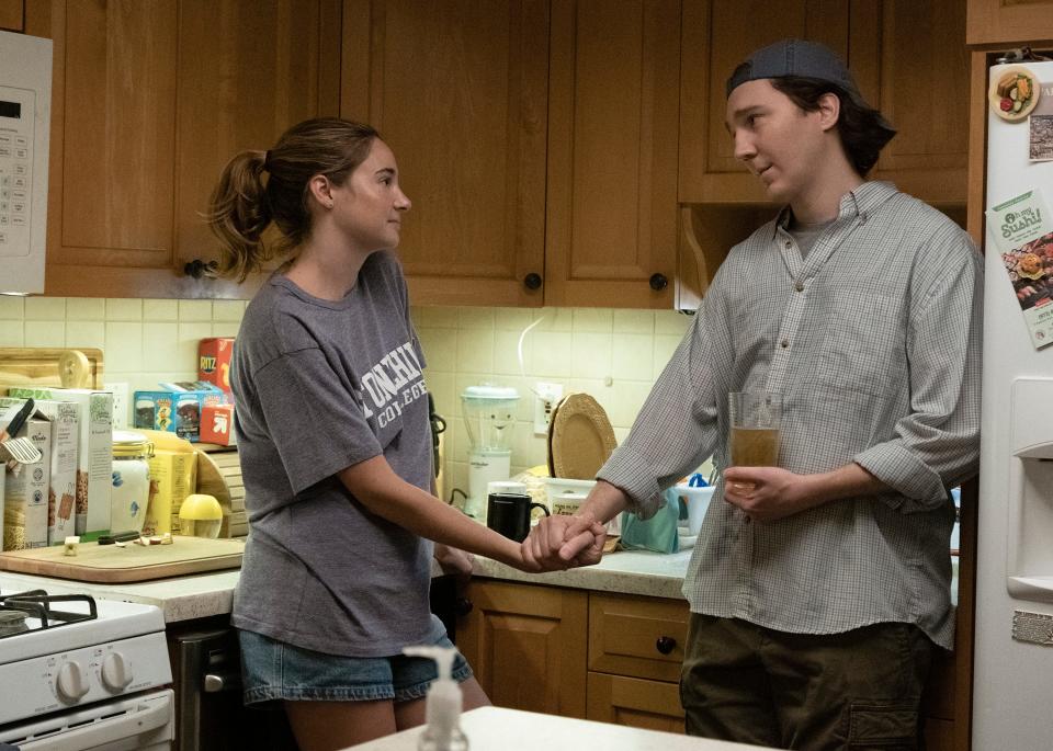 Keith (Paul Dano, right) gets encouragement from his wife, Caroline (Shailene Woodley), in a scene from "Dumb Money."