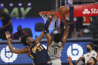 Washington Wizards forward Rui Hachimura, right, shoots against Golden State Warriors center James Wiseman during the first half of an NBA basketball game in San Francisco, Friday, April 9, 2021. (AP Photo/Jed Jacobsohn)