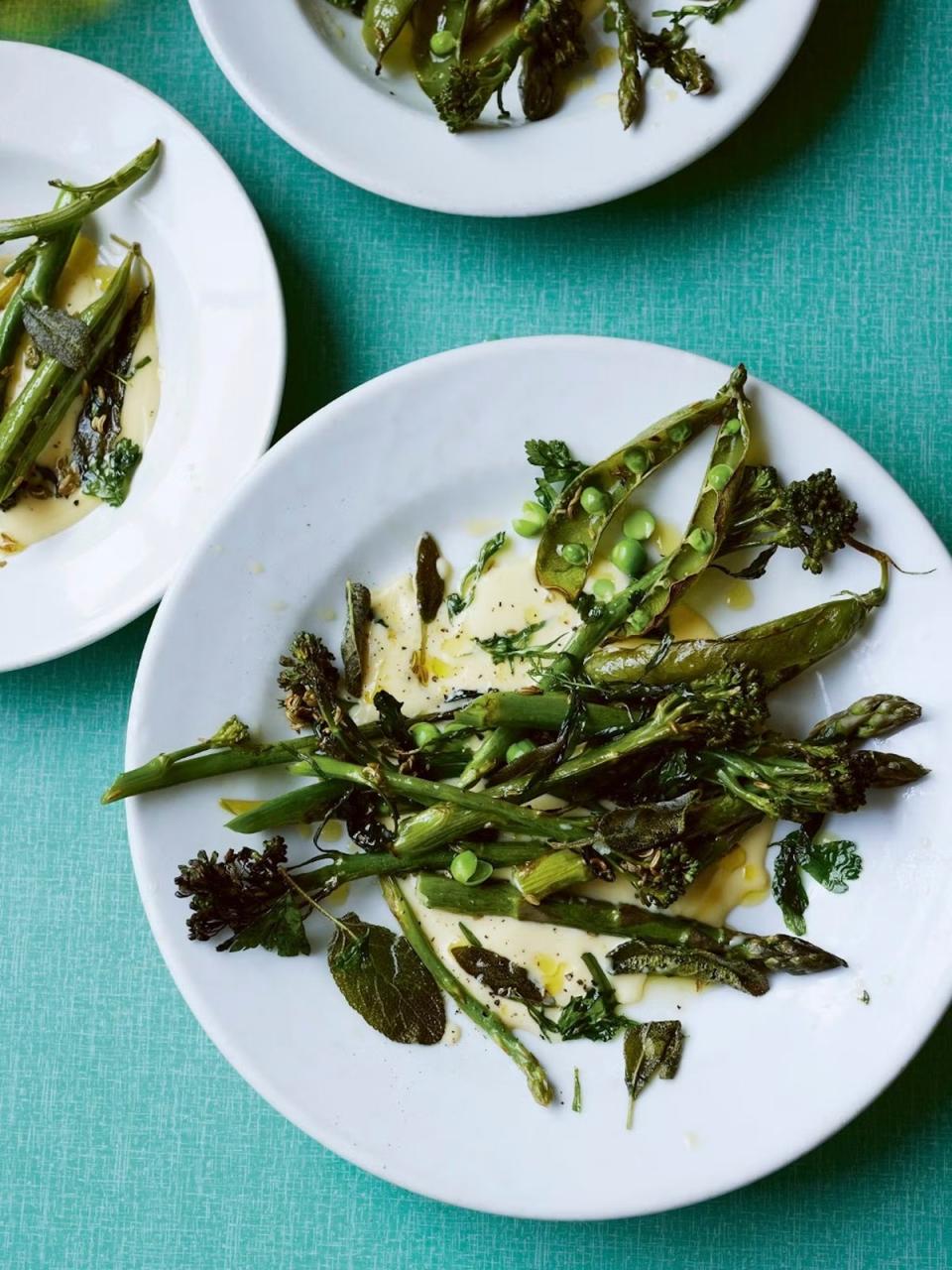 Roast spring vegetables with mustard cheese sauce, a recipe from the new book (Anna Jones/HarperCollins)