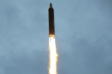 A missile is launched during a long and medium-range ballistic rocket launch drill in this undated photo released by North Korea's Korean Central News Agency (KCNA) in Pyongyang on August 30, 2017. KCNA/via REUTERS