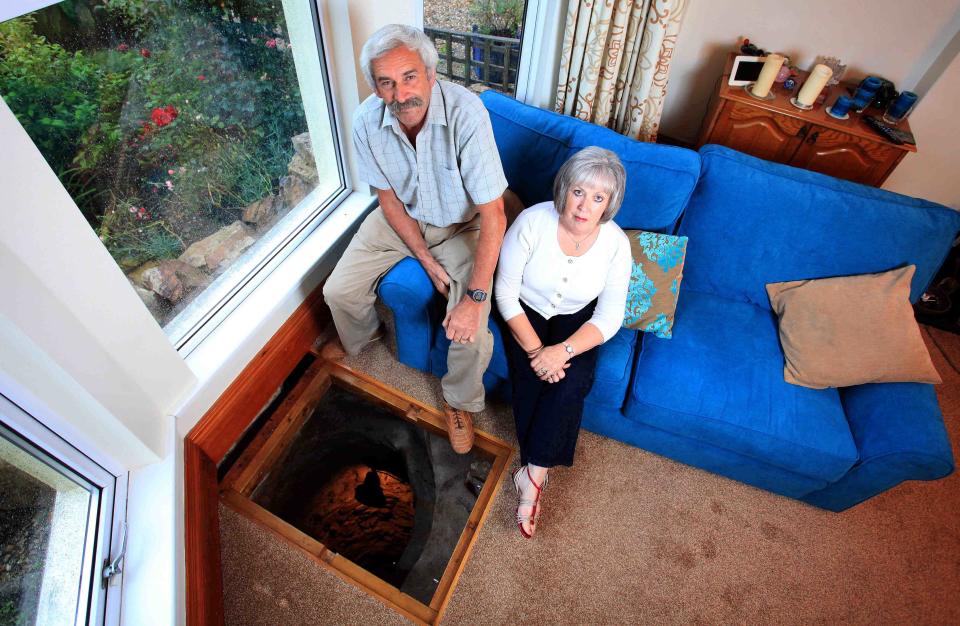 Colin Steer, and wife Vanessa, 61, who have lived in their Victorian home for 24 years first discovered a slight indentation in their living room floor after they moved in. Colin recently decided to investigate further and after a little digging discovered a 33ft well. No pot of gold down there but he did find a sword.