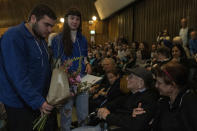 Holocaust survivor Bezalel Gross receives the Jewish Rescuers Citation for his role as a member of the Zionist youth movement underground in Hungary during the Holocaust, at Kibbutz HaZorea, northern Israel, Tuesday, Dec. 13, 2022. Just before Nazi Germany invaded Hungary in March 1944, Jewish youth leaders in the eastern European country jumped into action: they formed an underground network that in the coming months would rescue tens of thousands of fellow Jews from the gas chambers. (AP Photo/Tsafrir Abayov)