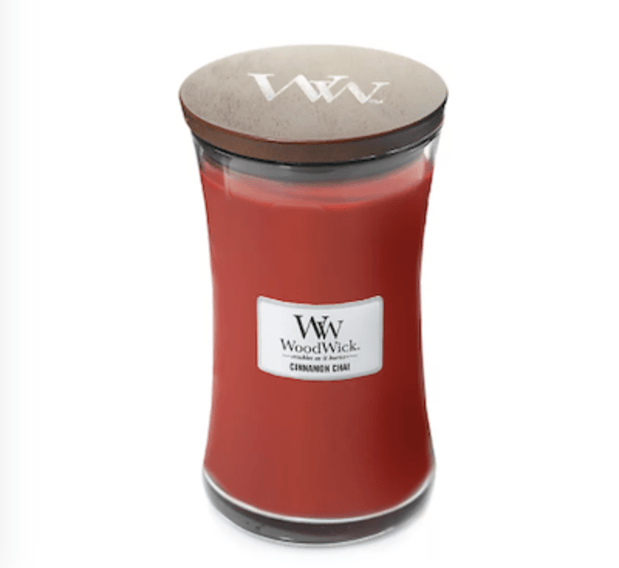 <p>It smells like the holidays in a jar.</p><p><strong><a href="https://www.amazon.com/Cinnamon-Woodwick-Candle-Glass-Large/dp/B01NANEHX5?hvadid=80333185890920&hvnetw=s&hvqmt=e&hvbmt=be&hvdev=c&hvlocint=&hvlocphy=&hvtargid=pla-4583932713568549&psc=1&linkCode=ll1&tag=parade03-20&linkId=325315474585eac98e7ab4501185b570&language=en_US&ref_=as_li_ss_tl" rel="nofollow noopener" target="_blank" data-ylk="slk:WoodWick Cinnamon Chai 22 oz. Jar Candle, $32.91 at Bed Bath & Beyond;elm:context_link;itc:0;sec:content-canvas" class="link ">WoodWick Cinnamon Chai 22 oz. Jar Candle, $32.91 at Bed Bath & Beyond</a></strong></p><p>Amazon</p>
