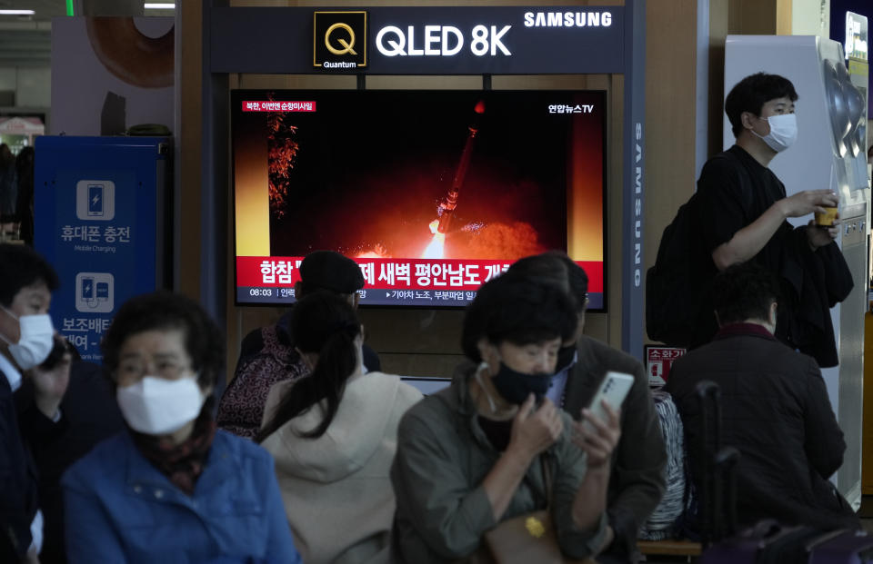 A TV screen shows an image of North Korea's missile launch during a news program at the Seoul Railway Station in Seoul, South Korea, Thursday, Oct. 13, 2022. North Korean leader Kim Jong Un supervised tests of long-range cruise missiles, which he described as a successful demonstration of his military's expanding nuclear strike capabilities and readiness for "actual war," state media said Thursday. (AP Photo/Ahn Young-joon)
