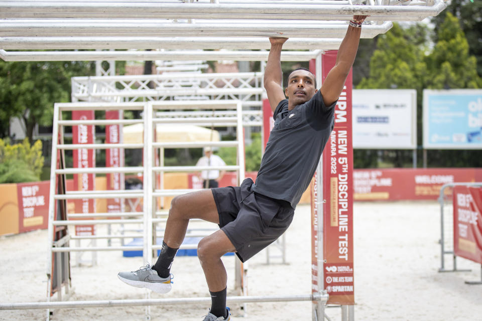 This photo provided by the Union Internationale de Pentathlon Moderne shows Yasser Hefny competing at a test event in Ankara, Turkey on June 28, 2022. As it stands now, modern pentathlon — a sport in the Olympics for more than 100 years — would be off the program in its current form after the 2024 Paris Games. (Augustas Didzgalvis/UIPM via AP)