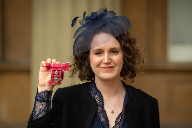 Composer Helen Grime with her MBE (Dominic Lipinski/PA)