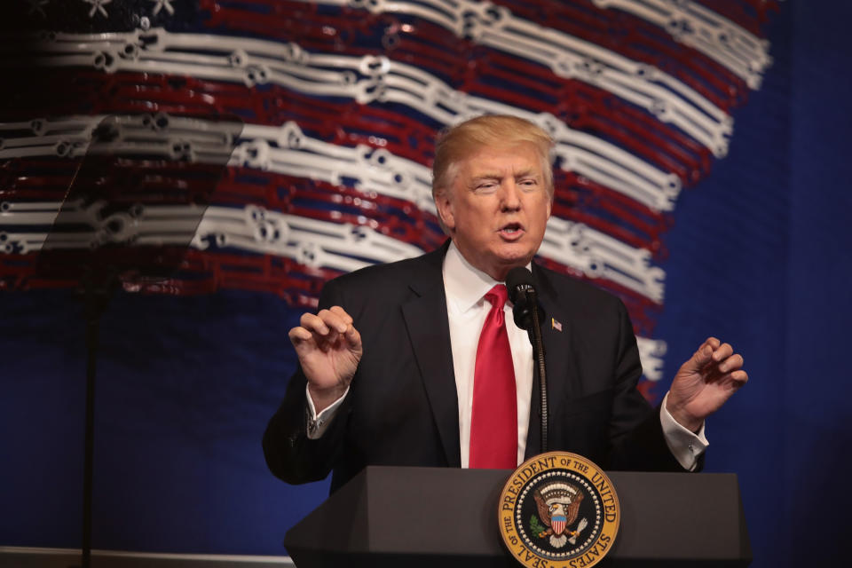 KENOSHA, WI - APRIL 18:  President Donald Trump speaks to workers at the headquarters of tool manufacturer Snap-On on April 18, 2017 in Kenosha, Wisconsin. During the visit, Trump signed an executive order to try to bring jobs back to American workers and revamp the H-1B visa guest worker program.  (Photo by Scott Olson/Getty Images)