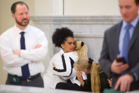 Bill Cosby accusers Lili Bernard and Caroline Heldman react after the guilty on all counts verdict was delivered in the sexual assault retrial at the Montgomery County Courthouse on April 26, 2018 in Norristown, Pennsylvania. Mark Makela/Pool via REUTERS/Files