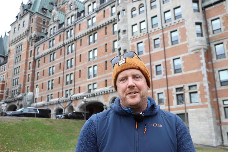 John Morris, a professional photographer from P.E.I., said he was trying to get the perfect shot of the iconic hotel when police approached him. (Émilie Warren/CBC - image credit)