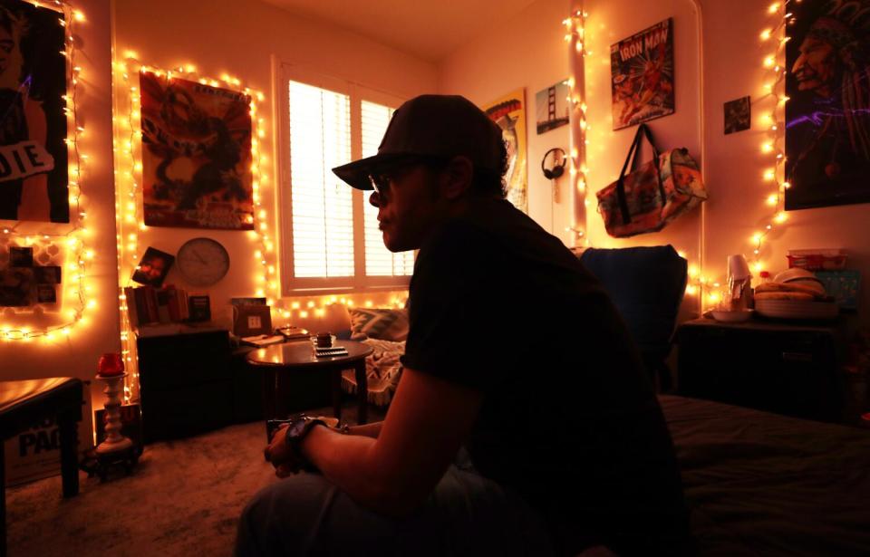 Dexter Johnson, 53, in his room at the Cecil Hotel.