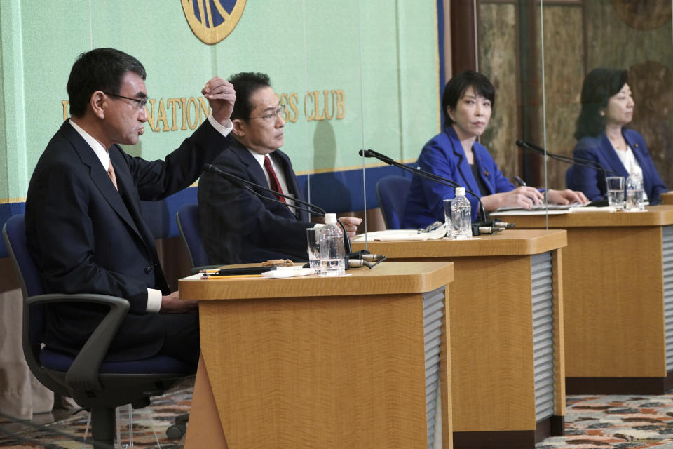 Candidates for the presidential election of the ruling Liberal Democratic Party attend a debate session hosted by the Japan National Press Club Saturday, Sept. 18, 2021 in Tokyo. The contenders are, from left, Taro Kono, the cabinet minister in charge of vaccinations, Fumio Kishida, former foreign minister, Sanae Takaichi, former internal affairs minister, and Seiko Noda, former internal affairs minister. (AP Photo/Eugene Hoshiko, Pool)