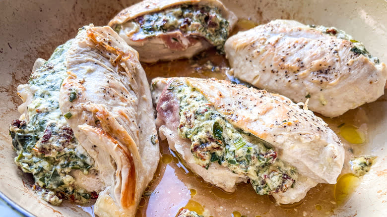 stuffed chicken breasts in pan