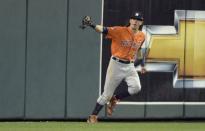 Oct 8, 2015; Kansas City, MO, USA; Houston Astros left fielder Colby Rasmus (28) celebrates after catching a fly ball against the Kansas City Royals to end game one of the ALDS at Kauffman Stadium. Denny Medley-USA TODAY Sports