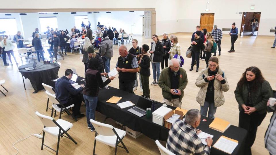Volunteers arrive at the San Luis Obispo Veteran’s Hall. The Point-In-Time Count of the county’s unhoused population took place on Jan. 23, 2024.