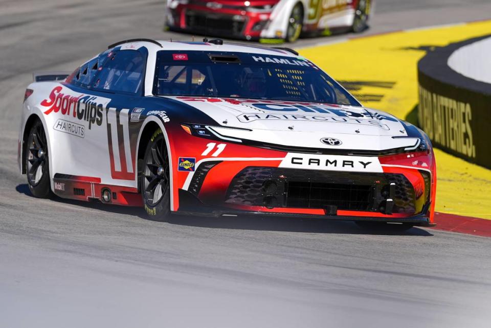 Apr 6, 2024; Martinsville, Virginia, USA; NASCAR Cup Series driver Denny Hamlin (11) during practice at Martinsville Speedway. Jim Dedmon/USA TODAY Sports