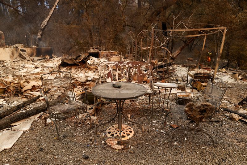 Remnants of a burned house are seen in Deer Park, California