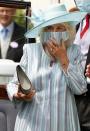 <p>Camilla perfectly matched her mask to her outfit. </p>