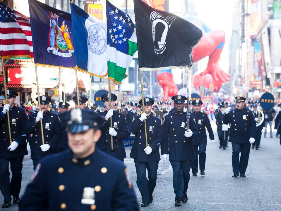 NYPD officers march in the Macy's thanksgiving day parade 2011