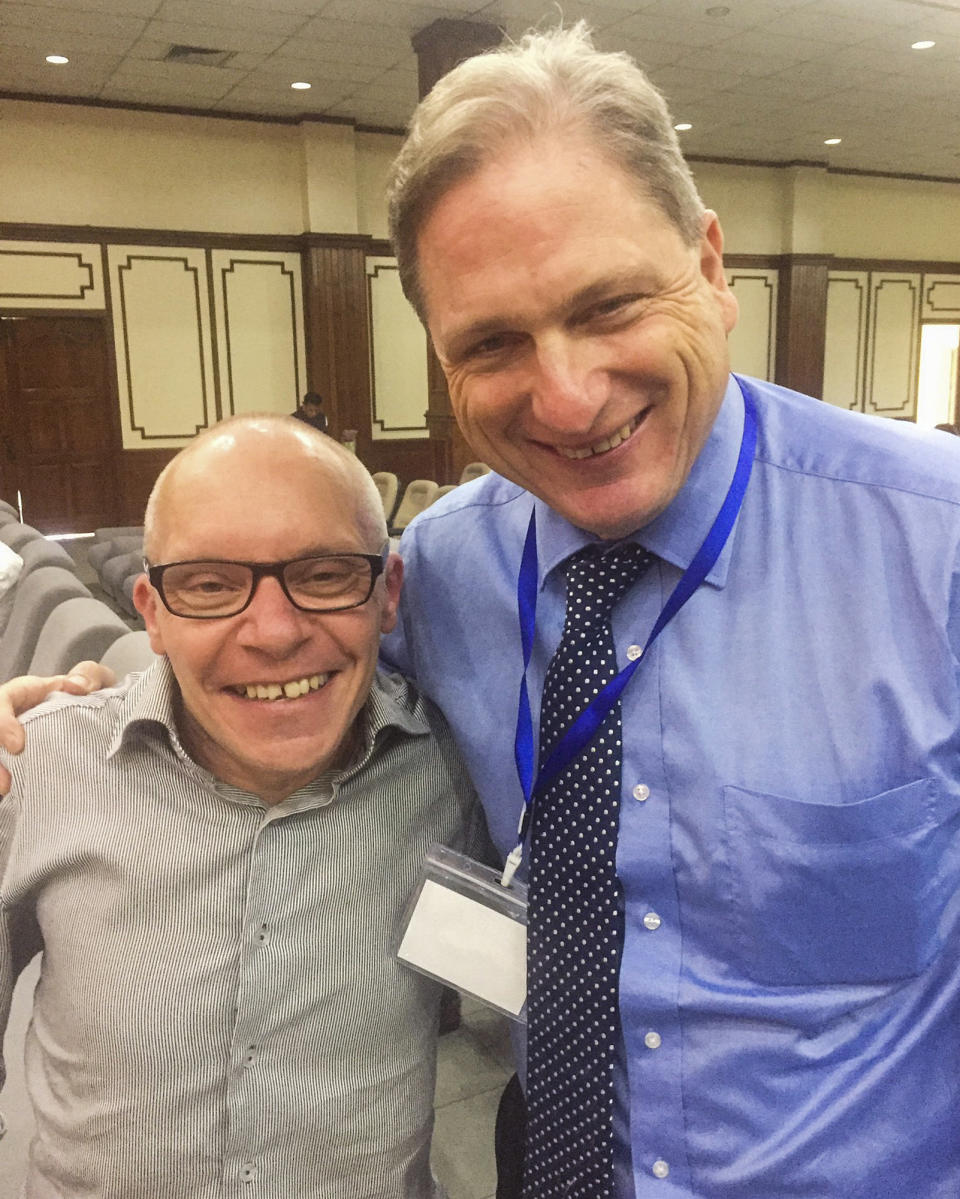 In this image supplied by Tim Harcourt, Sean Turnell, left, is pictured with Harcourt at the Australia Myanmar Institute conference at Yangon University, Yangon, Myanmar, November 2017. Myanmar's military-controlled government says it is releasing and deporting an Australian academic, Turnell, a Japanese filmmaker, an ex-British diplomat and an American as part of a broad prisoner amnesty to mark the country's National Victory Day Thursday, Nov. 17, 2022. (Tim Harcourt via AP)