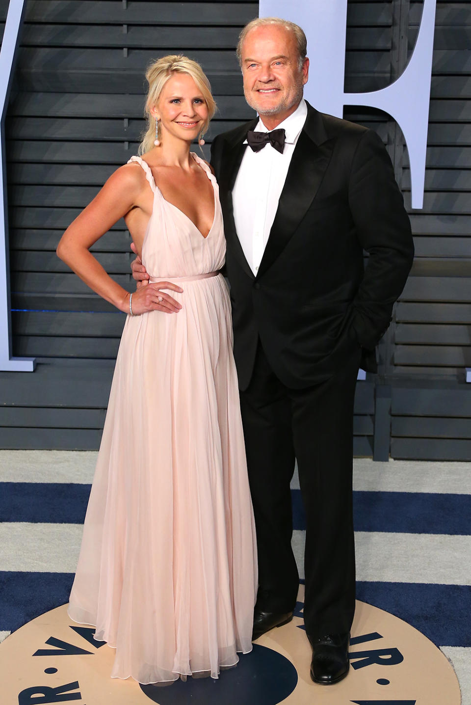 <p>The <em>Frasier</em> star and wife Kayte Walsh went for classic glamour. (Photo: JEAN-BAPTISTE LACROIX/AFP/Getty Images) </p>