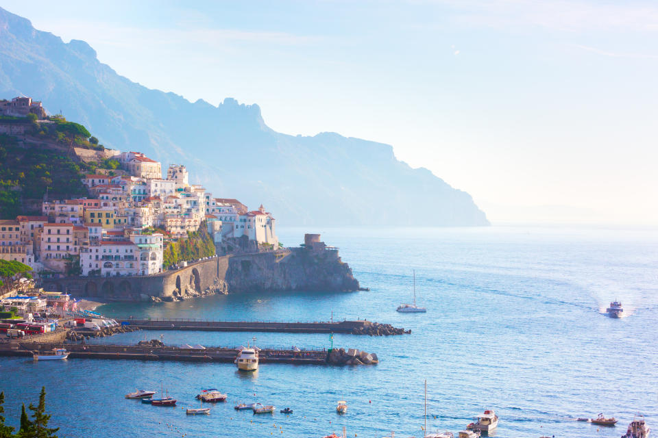 View of Amalfi with morning mist above the sea, Gulf of Salerno, Campania, Italy.