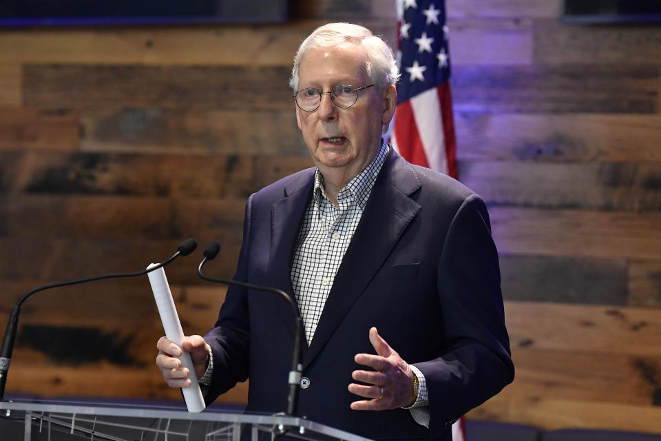 Senate Minority Leader Mitch McConnell, R-Ky., addresses the media at a COVID vaccination site at Kroger Field in Lexington, Ky., Monday, April 5, 2021. (AP Photo/Timothy D. Easley)