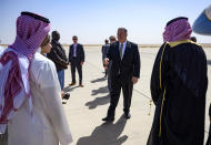 US Secretary of State Mike Pompeo prepares to board a plane at the King Khalid International Airport in the Saudi capital Riyadh, before his departure on Friday Feb. 21, 2020. (Andrew Caballero-Reynolds/Pool via AP)