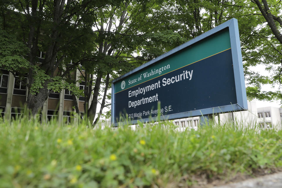 This photo shows a sign at the headquarters for Washington state's Employment Security Department Tuesday, May 26, 2020, at the Capitol in Olympia, Wash. Washington state's rush to get unemployment benefits to residents who lost jobs due to the coronavirus outbreak left it vulnerable to criminals who made off with hundreds of millions of dollars in fraudulent claims. (AP Photo/Ted S. Warren)