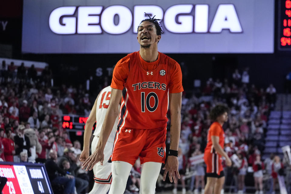 Auburn guard Chad Baker-Mazara reacts after a basket during the first half of an NCAA college basketball game against Georgia Saturday, Feb. 24, 2024, in Athens, Ga. (AP Photo/John Bazemore)