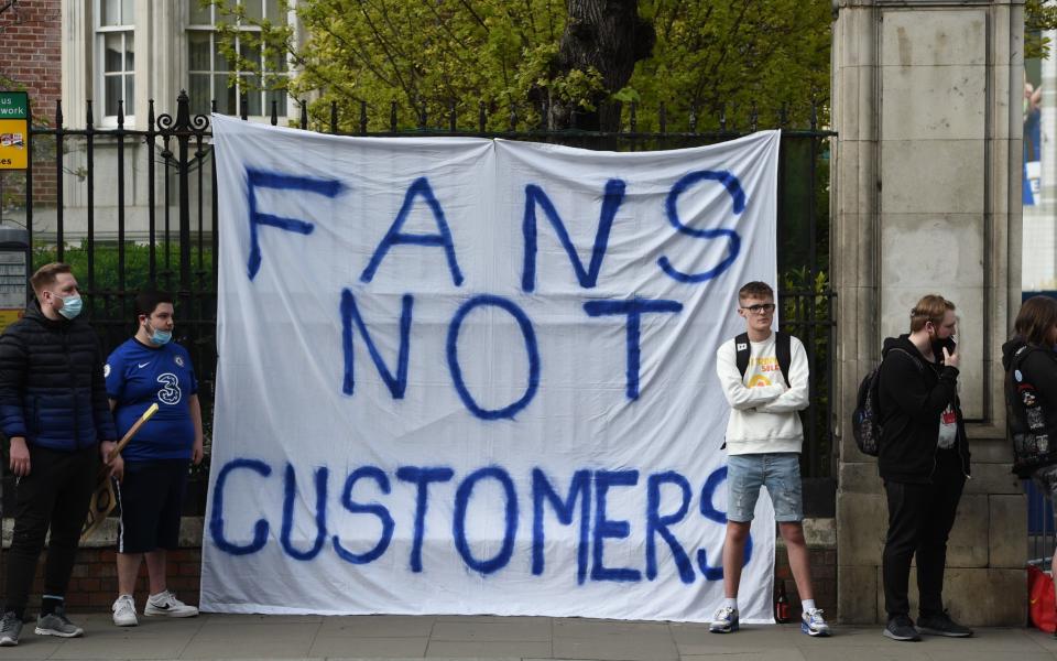 Chelsea fans protest against the newly proposed European Super League  - EDDIE MULHOLLAND FOR THE TELEGRAPH