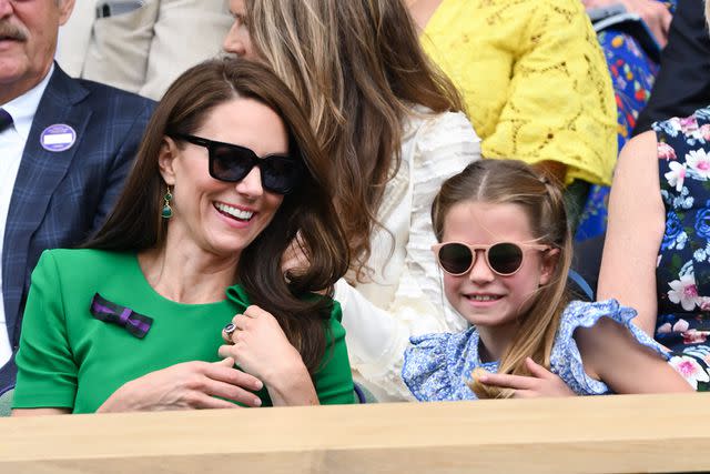 <p>Karwai Tang/WireImage</p> Kate Middleton and Princess Charlotte watch Wimbledon in July.