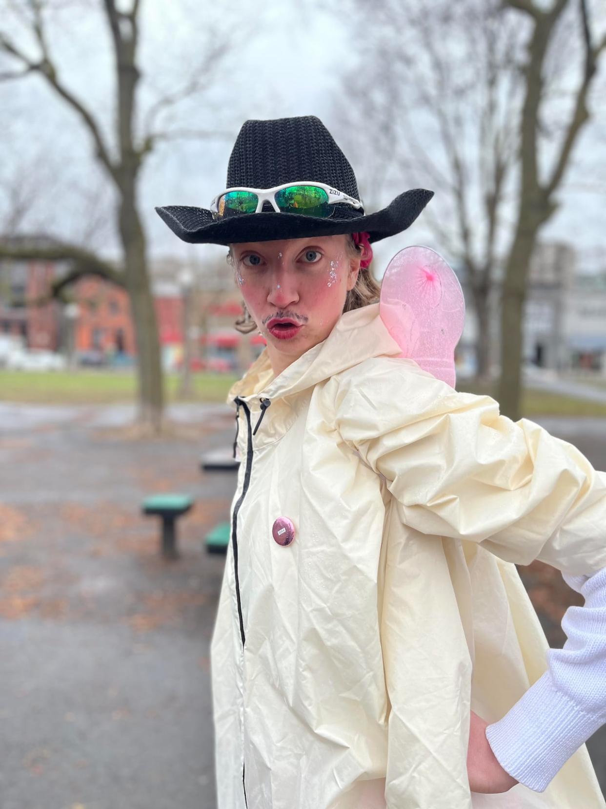 Drag king Morgan mercury dons a cowboy hat and fairy wings for their guided walking tours of Centretown. The tours, which began earlier in 2024, are intended to showcase the queer history of the downtown Ottawa neighbourhood. (Maggie May Harder - image credit)