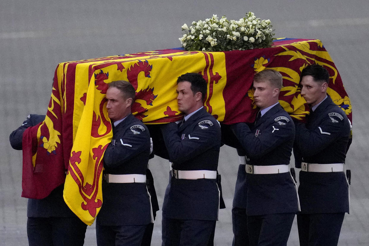 The bearer party from the Queen's Colour Squadron (63 Squadron RAF Regiment) carry the coffin of Queen Elizabeth II to the waiting hearse at RAF Northolt, west London, from where it will be taken to Buckingham Palace, London, to lie at rest overnight in the Bow Room. Picture date: Tuesday September 13, 2022.