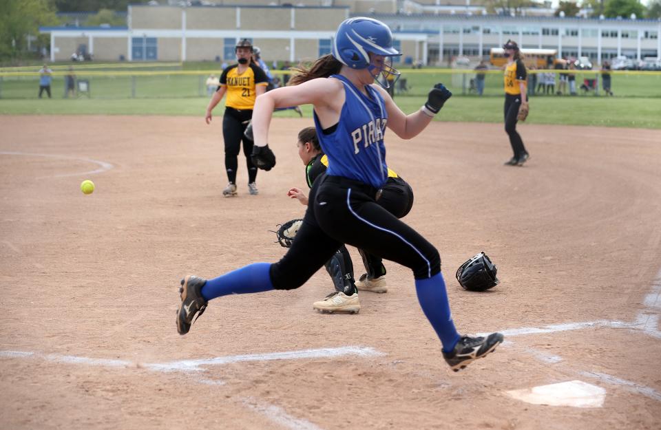 Pearl River's Maeve Woods (17) scores from second in the first inning against Nanuet in softball action at Pearl River High School  May 11, 2022. Pearl River won the game 15-0.