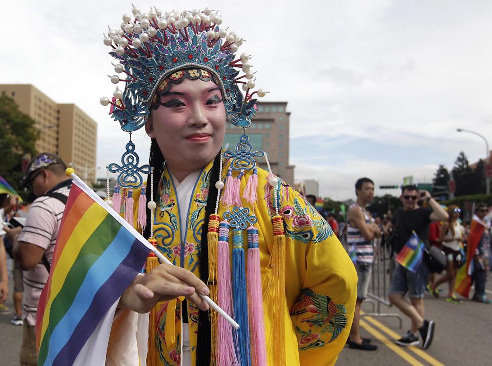 A man dressed in a Chinese opera costume takes part in the Taiwan LGBT Pride Parade in Taipei