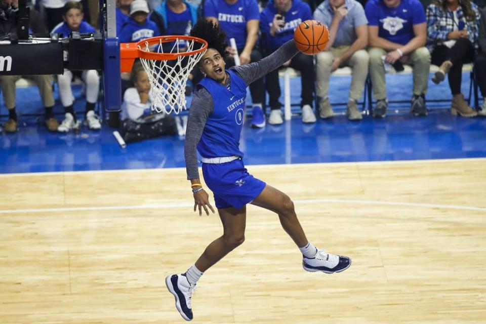 Former Kentucky player Jacob Toppin throws down a dunk during Big Blue Madness in Rupp Arena last season.