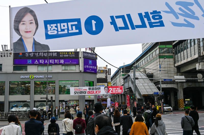 Banners for opposing National Assembly candidates hang over an intersection in Seoul on Wednesday. Photo by Thomas Maresca/UPI