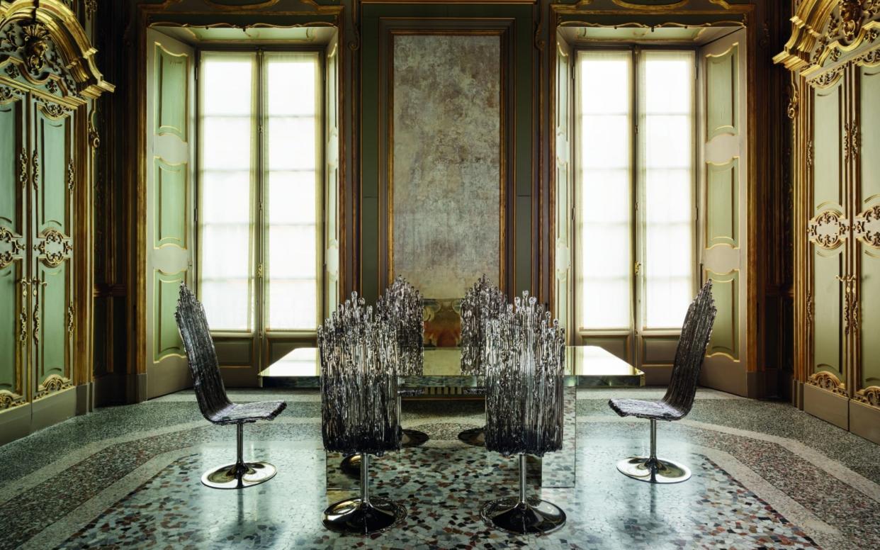  Milan Design Week Edra Phantom glass table and Milano crystal chair in baroque room. 