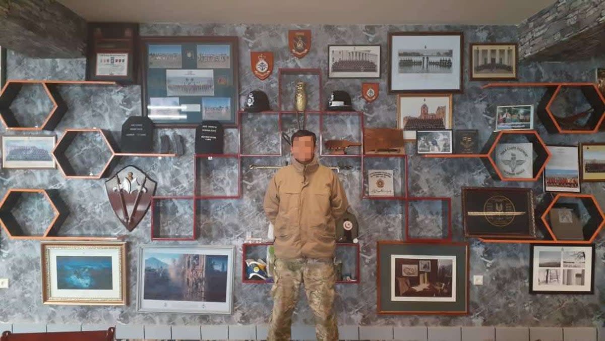 An Afghan special forces soldier stands in a meeting room used by Afghan and British mentors (Supplied)