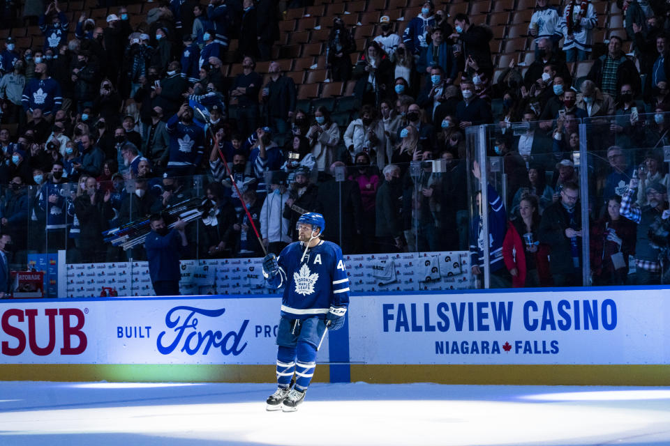 TORONTO, ON - DECEMBER 7: Morgan Rielly #44 of the Toronto Maple Leafs salutes the crowd after receiving a star of the game after defeating the Columbus Blue Jackets during the third period at the Scotiabank Arena on December 7, 2021 in Toronto, Ontario, Canada. (Photo by Kevin Sousa/NHLI via Getty Images)