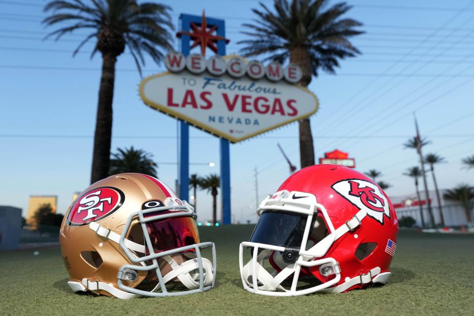Jan 30, 2024; Las Vegas, NV, USA; San Francisco 49ers and Kansas Chiefs helmets at the Welcome to Fabulous Las Vegas sign. Mandatory Credit: Kirby Lee-USA TODAY Sports