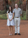 <p>Kate donned a chequered tea dress by Hobbs for a trip to Uluru, Australia accessorised with a white belt and grey suede wedges.</p><p><i>[Photo: PA]</i></p>