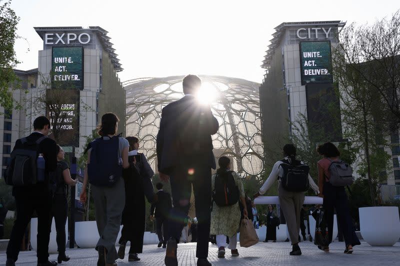 Attendees arrive for the opening of U.N.'s COP28 climate summit in Dubai