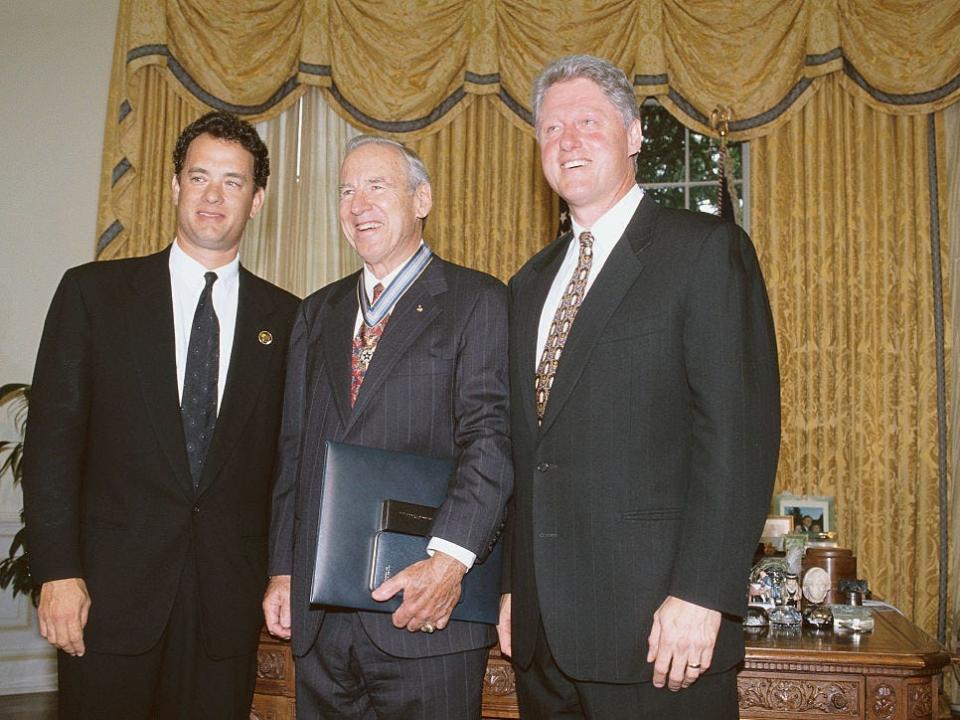 President Clinton stands with movie star Tom Hanks and astronaut James A. Lovell during their visit to the White House. Tom Hanks plays the role of James Lovell, who was the commander of the Apollo 13 mission, in Ron Howard's 1995 drama, Apollo 13.